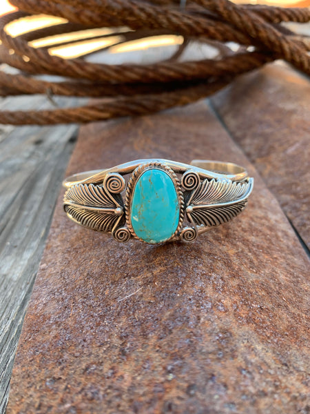 Feathers with Kingman Turquoise cuff